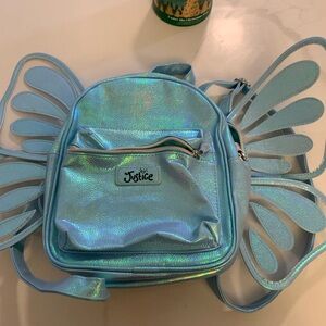Great deal!! Justice Shiny iridescent Blue Backpack with Wings